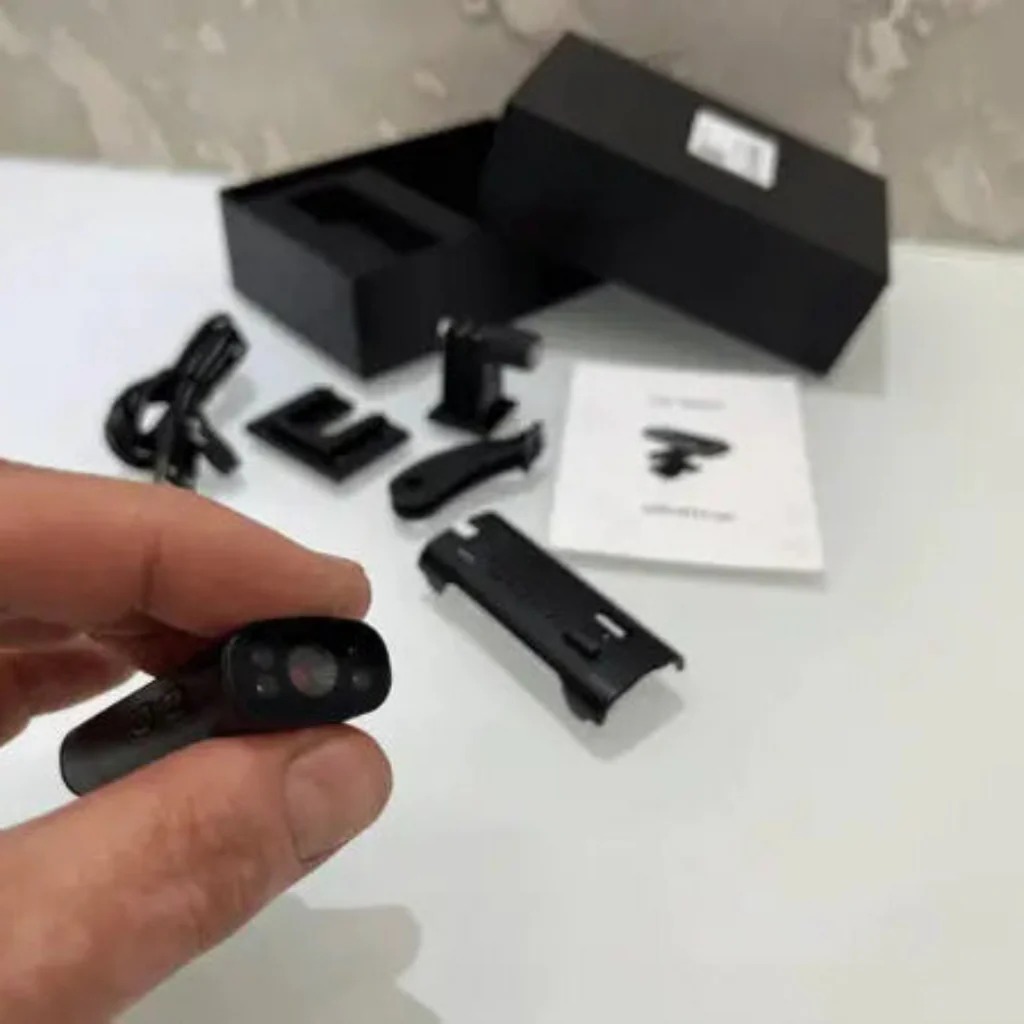The actual wireless camera and mounting accessories unpacked